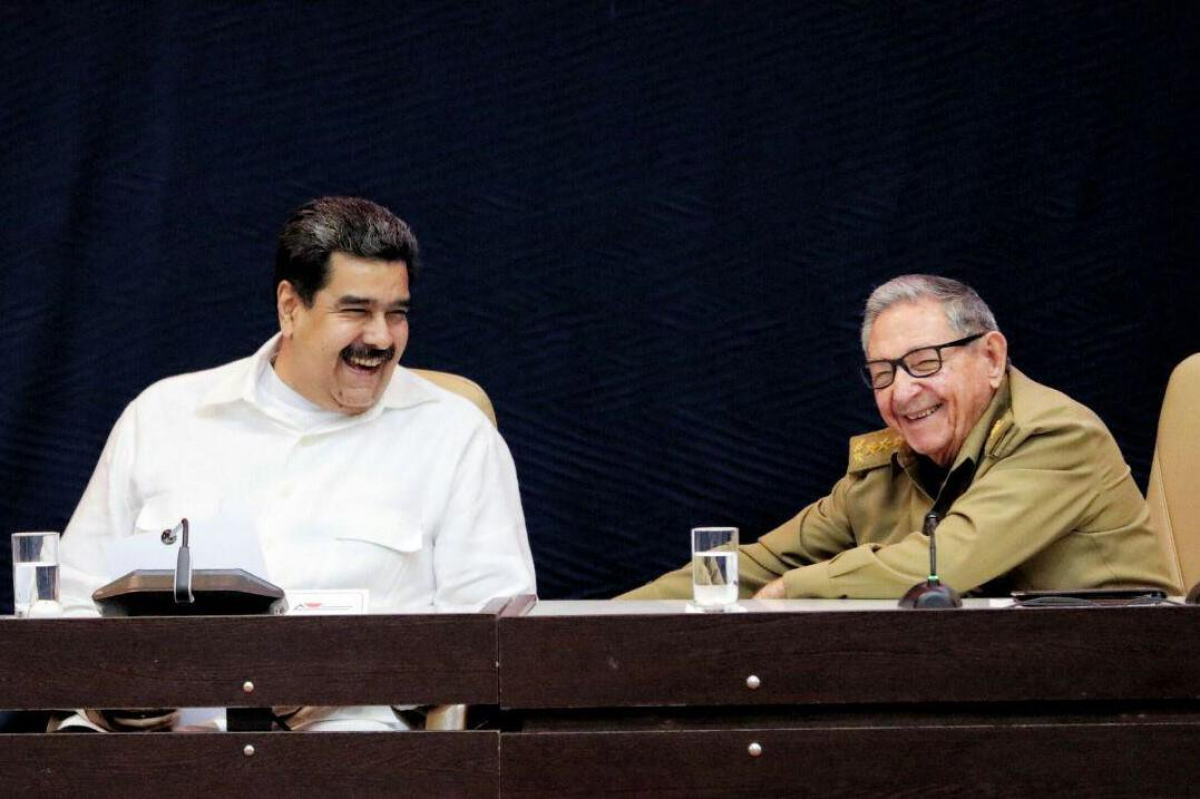 Nicolás Maduro and Raúl Castro.