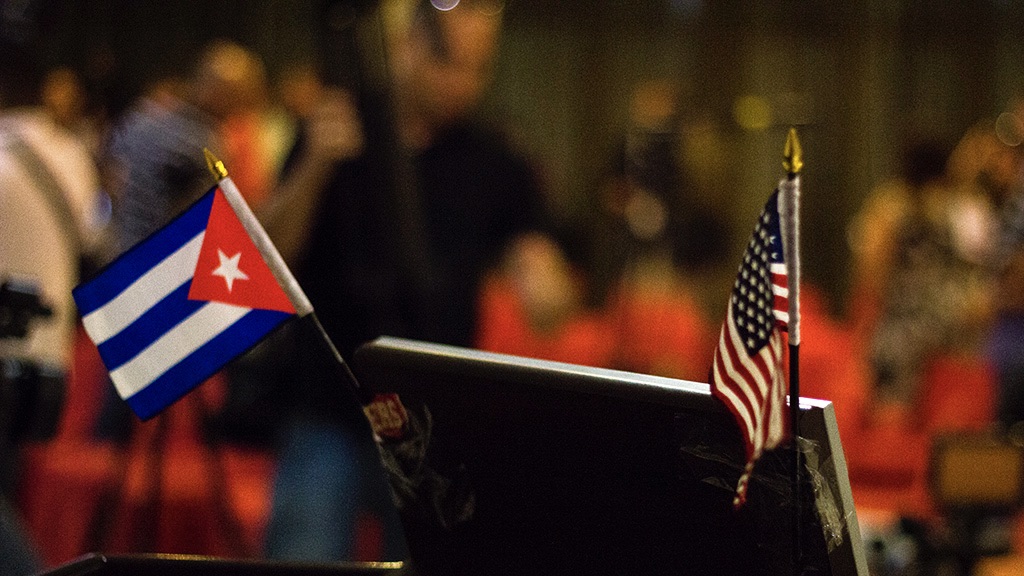 The Cuban and US flags.