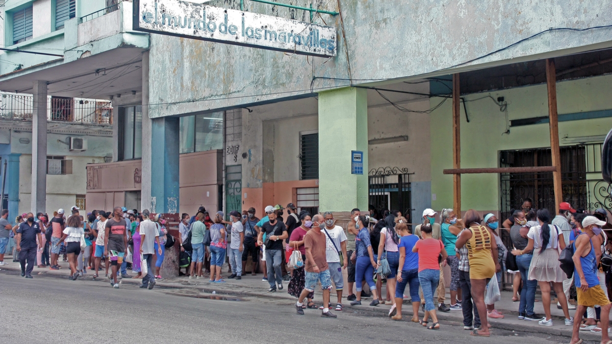 Cubans in a line in Havana.