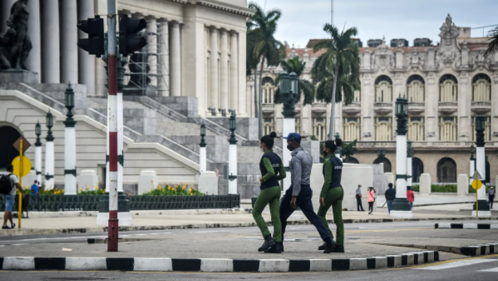 Police officers near the Capitol in Havana. 