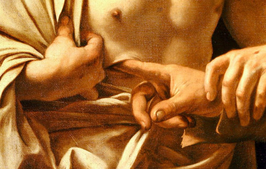Detalle de 'Santo introduciendo un dedo en la llaga de Cristo', de Caravaggio.