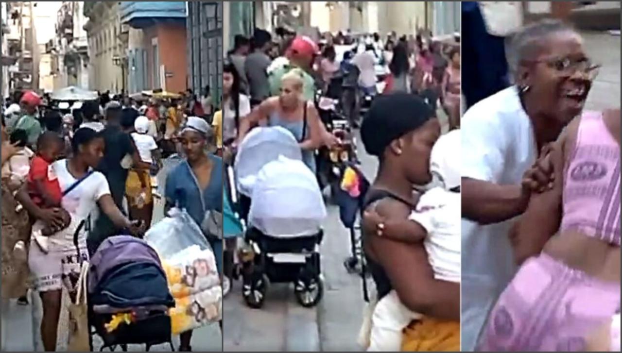 Madres cubanas en una cola para comprar pañales huyen de un presunto ataque de un policía con spray.