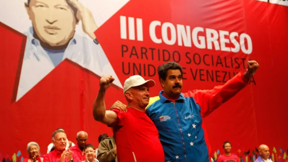 Hugo Carvajal y Nicolás Maduro.