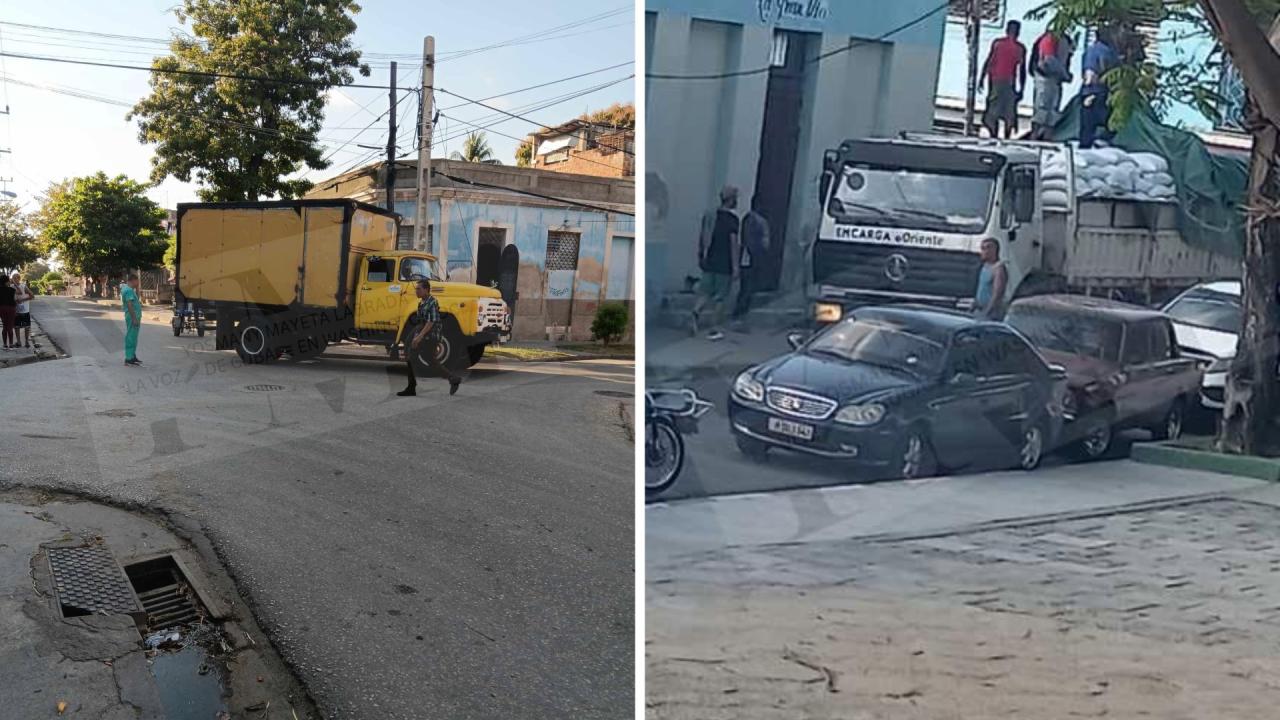 Camiones distribuyen alimentos en una bodega en Santiago de Cuba.