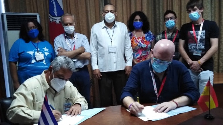 Firma de protocolo de intención entre la española ISCOD y la CTC, La Habana, 2022.