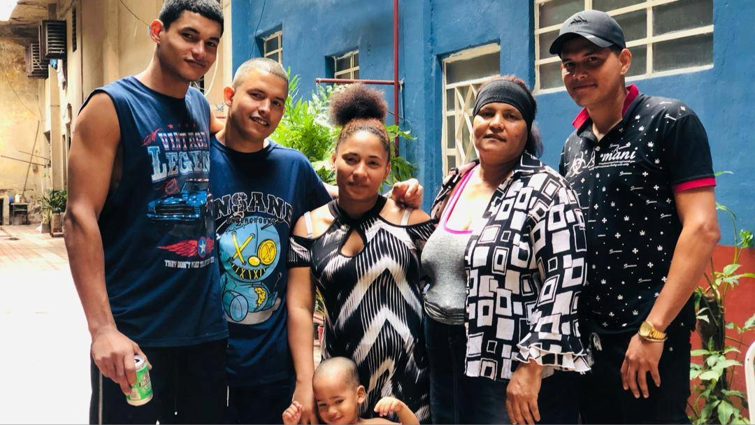 Luis Robles (second left) with his family.