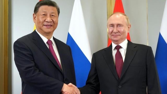 Vladimir Putin y Xi Jinping en Astana.