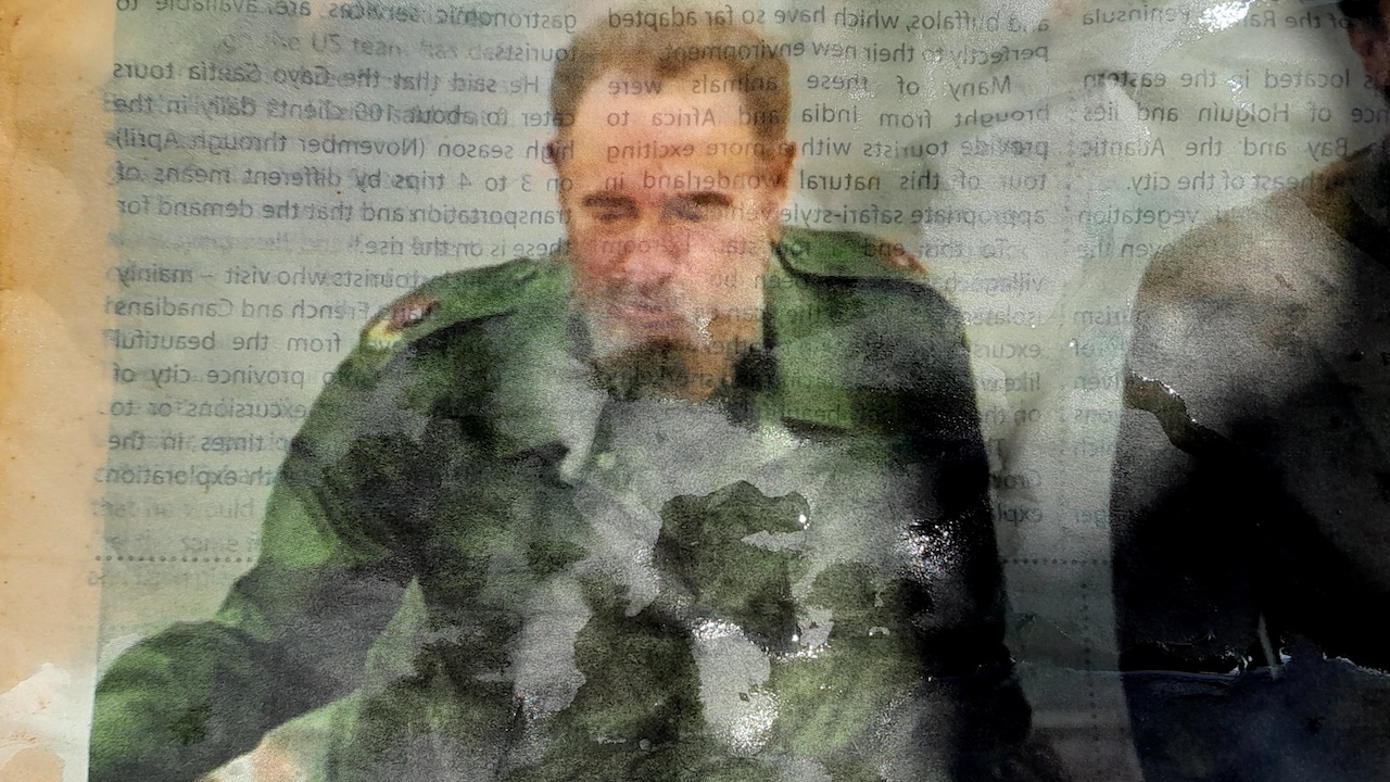 Image of Fidel Castro in a wet newspaper.