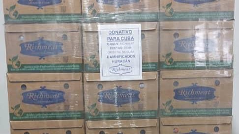 Cajas de picadillo donadas por México a Cuba.