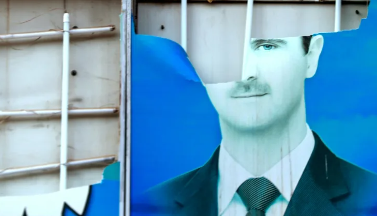 Cartel lumínico de Bashar al Assad en la ciudad siria de Qamishli.