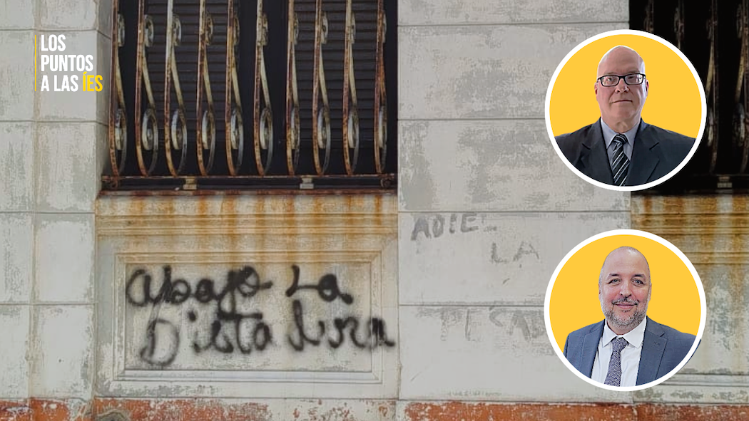 Los activistas Orlando Gutiérrez-Boronat y Yaxys Cires Dib. De fondo, una pintada en una pared de La Habana.
