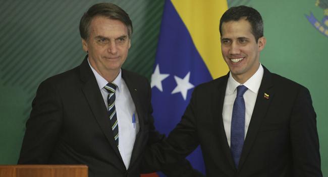 El presidente de Brasil, Jair Bolsonaro, y el líder opositor venezolano Juan Guaidó