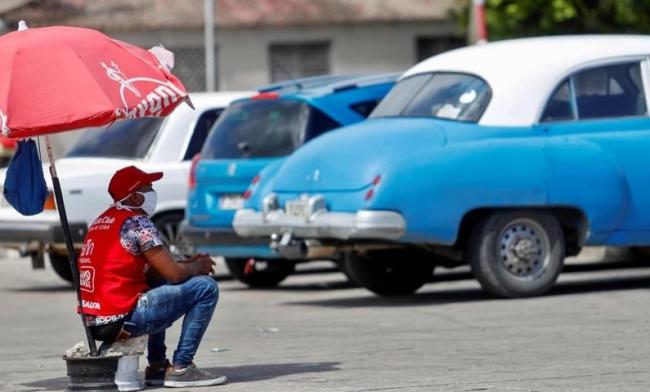 Un parqueador en La Habana.