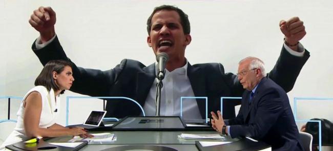 Josep Borrell y, en el fondo, una imagen de Juan Guaidó, durante un programa televisivo.