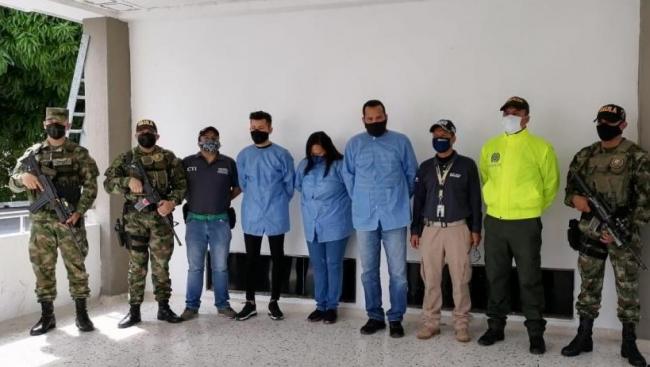 Funcionarios detenidos en Colombia.