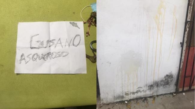 El cartel y la fachada de la casa del sacerdote cubano vandalizada.