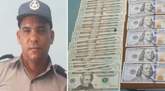 Agente de Policía que encontró otra gran suma de dólares y lo devolvió.