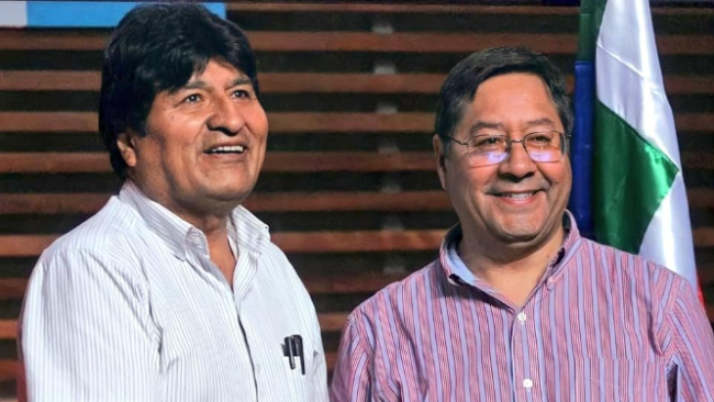 Evo Morales (i) y Luis Arce.