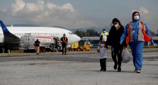 Migrantes venezolanos retornados a sus país desde EEUU.