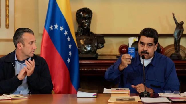 Tareck El Aissami y Nicolás Maduro.