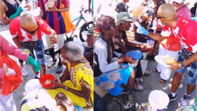 Entrega de almuerzos a ancianos pobres en Santiago de Cuba.