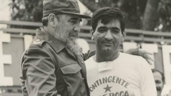 Fidel Castro y Cándido Palmero en un acto público.