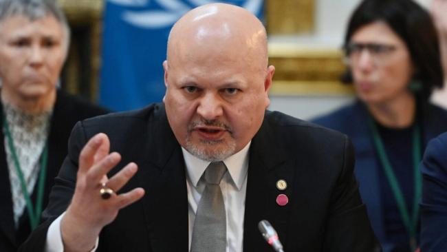 Karim Khan.