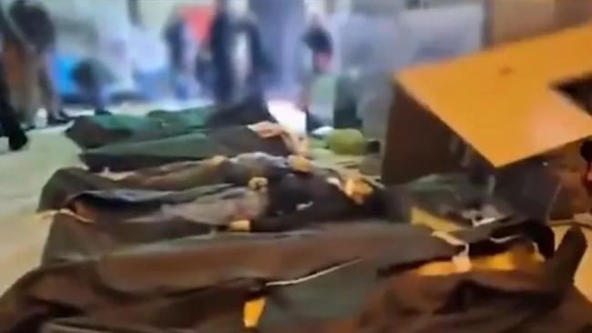Cuerpos de víctimas de las protestas contra el régimen islámico en Irán. 