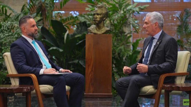 Miguel Díaz-Canel y el periodista Oliver Zamora.