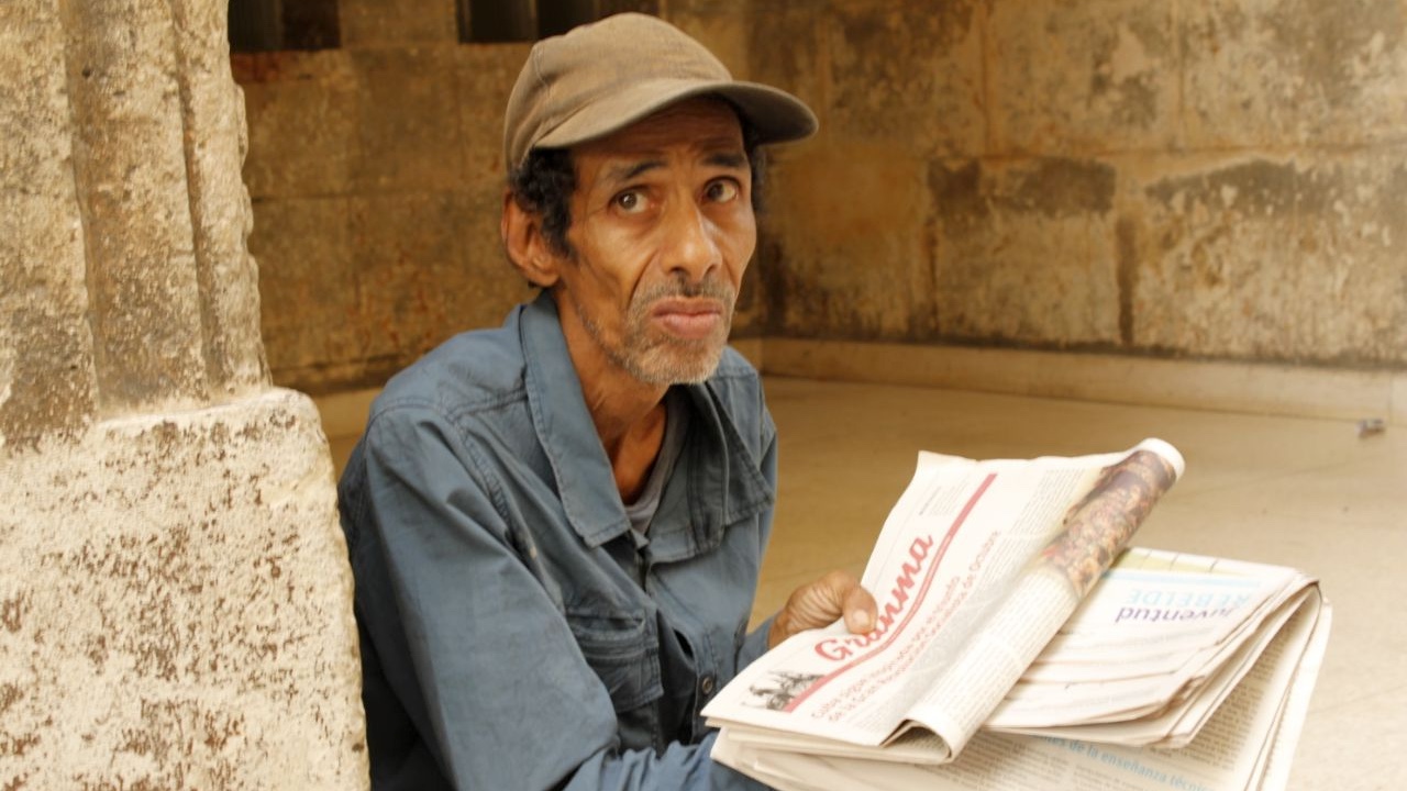 A Cuban selling newspapers in Havana. 